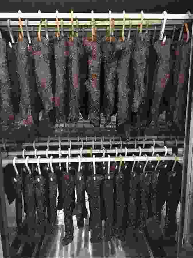 Close Up Of Thinly Sliced Biltong Hanging On A Drying Rack. South African Cooking In The USA