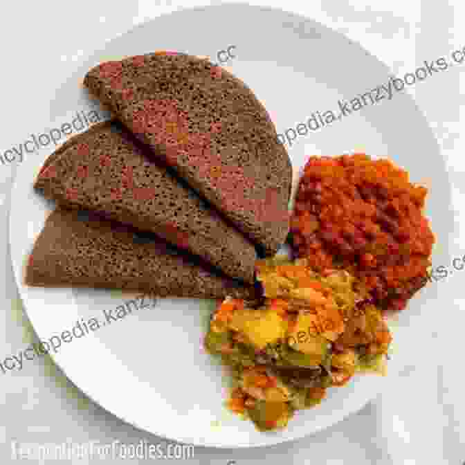 Injera: A Sourdough Flatbread Made From Teff Flour, A Staple In Ethiopian Cuisine. Top 25 African Recipes Get Top 25 Famous African Recipes Now