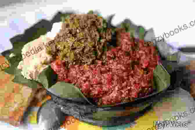 Kitfo: A Raw Minced Beef Dish Popular In Ethiopia, Often Served With Injera And Spices. Top 25 African Recipes Get Top 25 Famous African Recipes Now