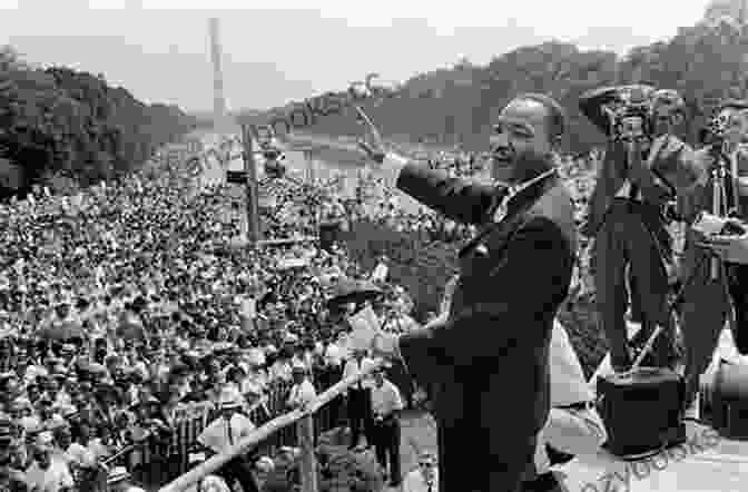 People Gathered At A Martin Luther King Jr. Day Event, Listening To A Speech By A Community Leader What Is Martin Luther King Jr Day?